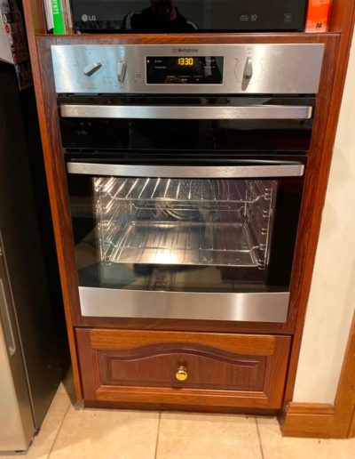 New oven with separate grill and stainless steel trim - in North Adelaide