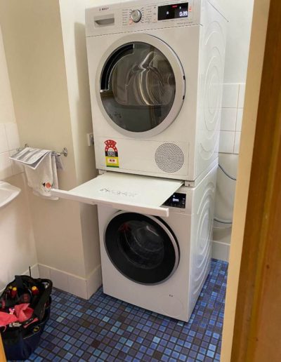 Bosch washer and dryer installed with stacker kit at Kensington in SA